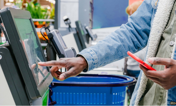 Man at register at Walmart store