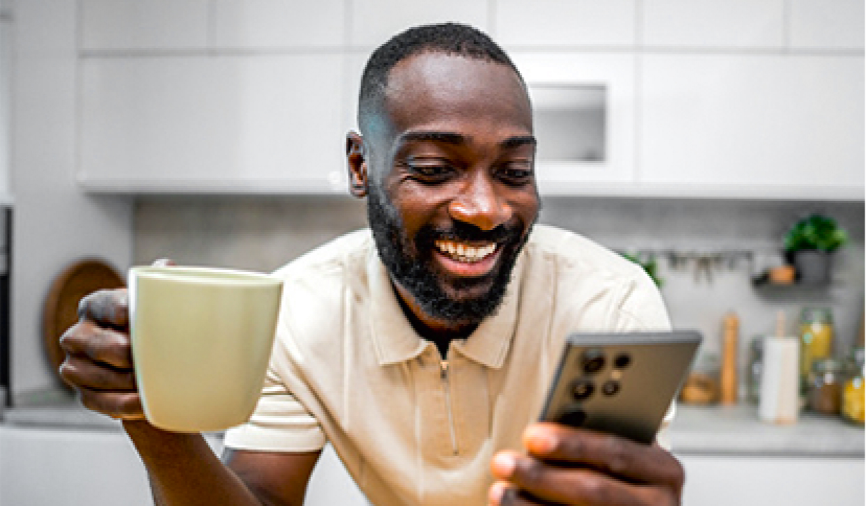 Person holding Walmart MoneyCard Mobile App